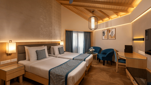 A Superior Deluxe Twin Room with twin beds at Kenilworth Resort & Spa, Goa